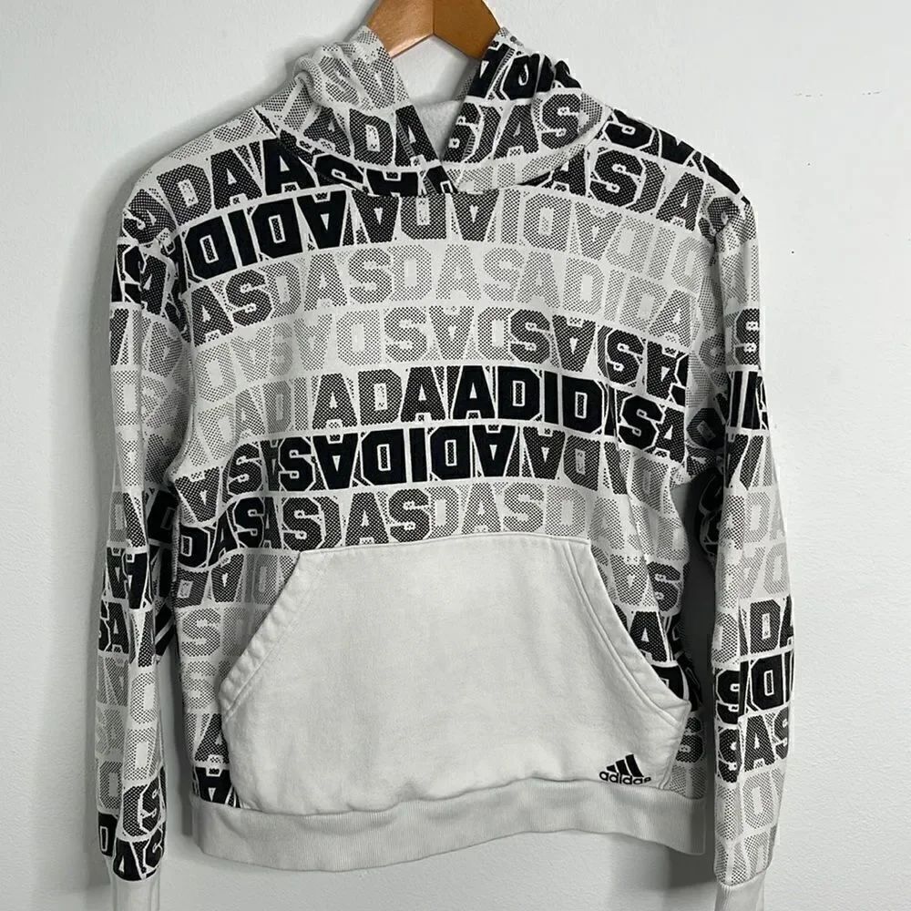Adidas classic pullover hoodie.  Size Boys XL.  Front hand warmer pocket.